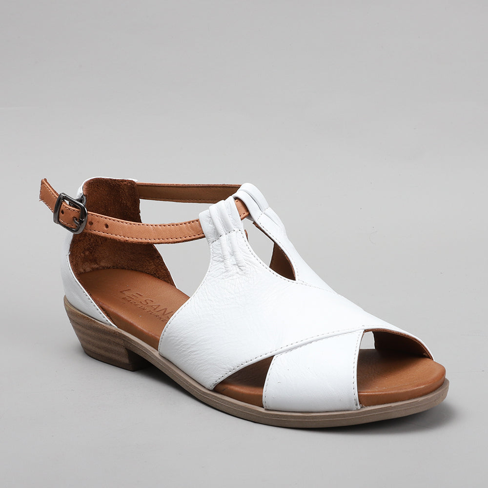 Le Sansa Digby white and tan sandals with straps, casual footwear, featuring a sleek design and comfortable sole.