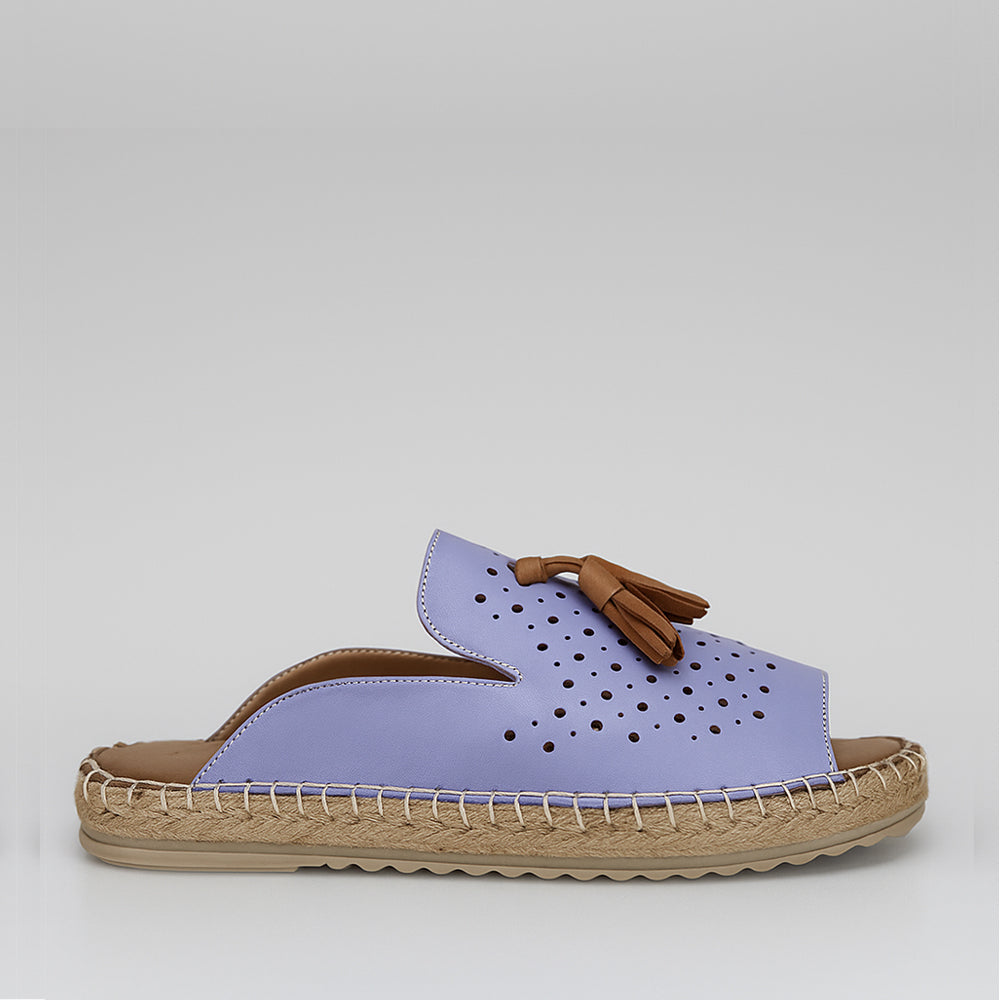 LE SANSA Dolonda lavender slip-ons with a comfortable design and soft fabric, ideal for casual wear.