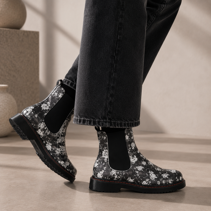 Le Sansa Dingo Black Floral boots featuring black leather with floral embroidery design and sturdy sole.
