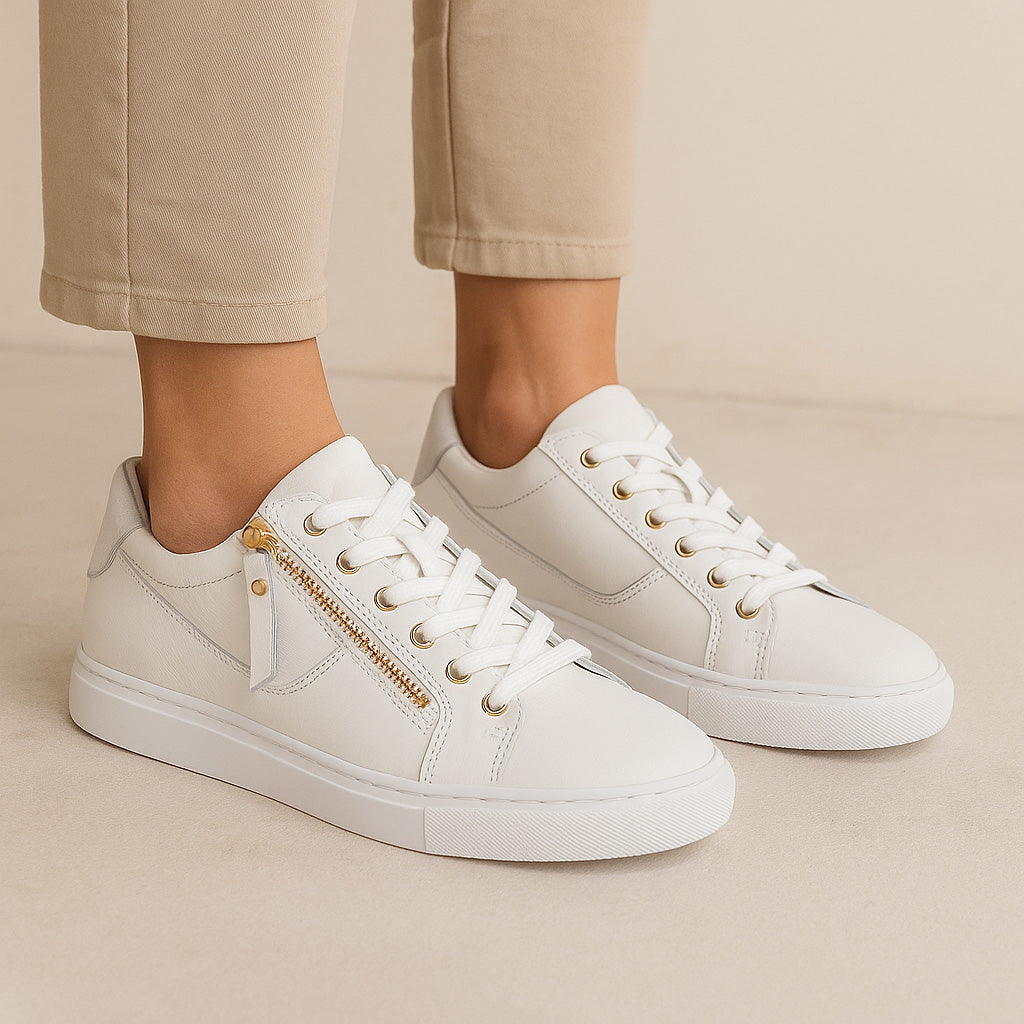 White Cabello EG520 sneakers with sleek design and comfortable fit, featuring white laces and stylish modern look.
