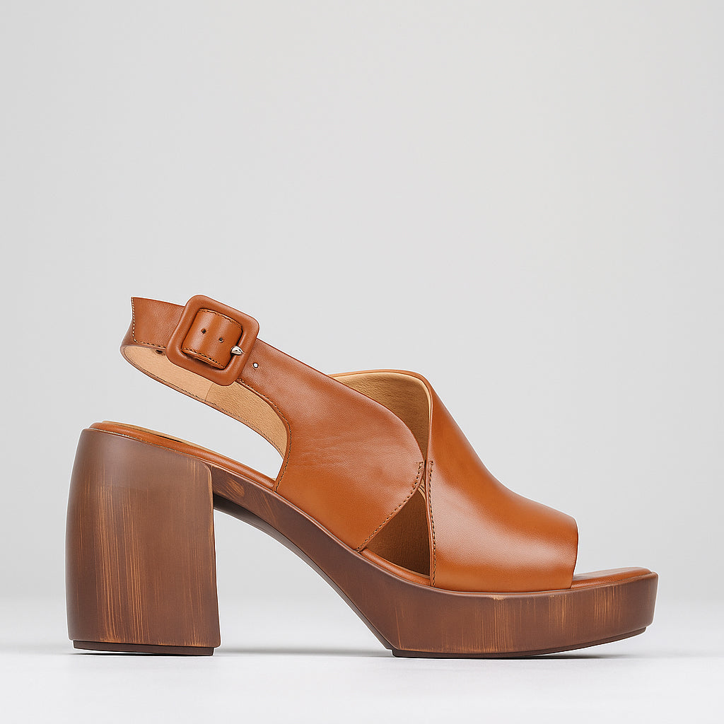 Eos Spicer Brand Sandals featuring tan leather straps and open toe design, casual footwear for warm weather.