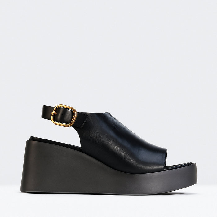 Black EOS Ariani sandals with open toes and ankle straps, stylish Eos brand footwear for warm weather.