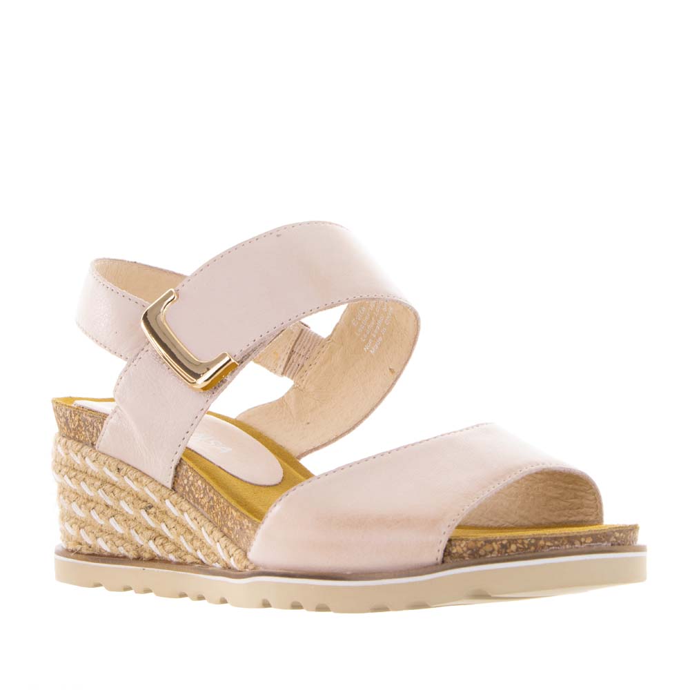 Le Sansa Evita Blush sandals featuring blush pink straps and flat sole, perfect for casual summer wear.