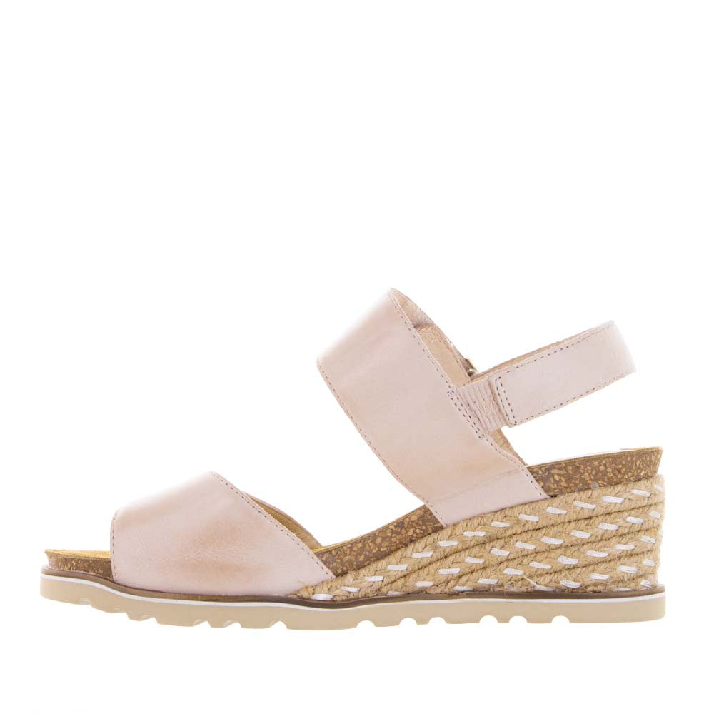 Le Sansa Evita Blush sandals with blush pink straps and buckle details, stylish and comfortable for casual wear.