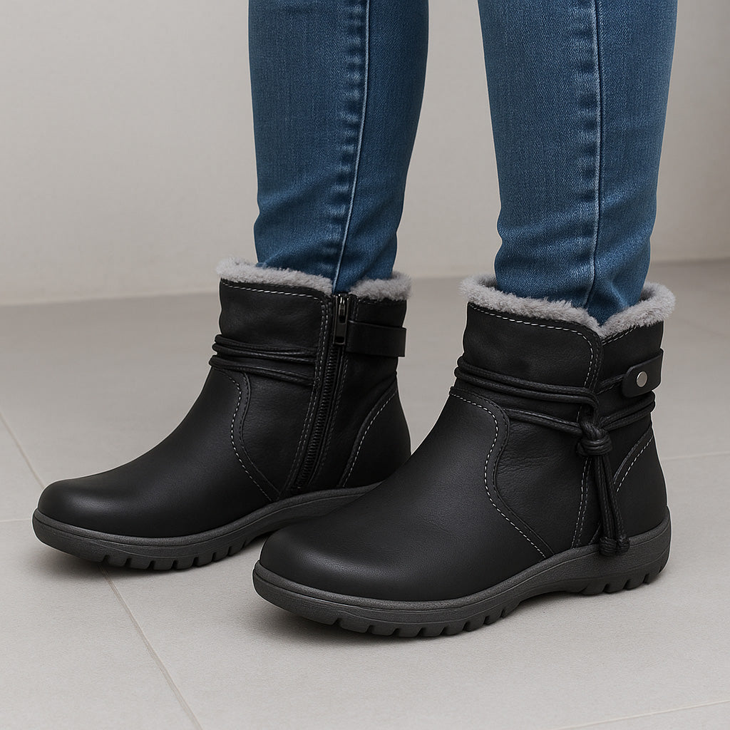 Black CC Resorts Gemma boots featuring stylish ankle design and sleek leather finish.
