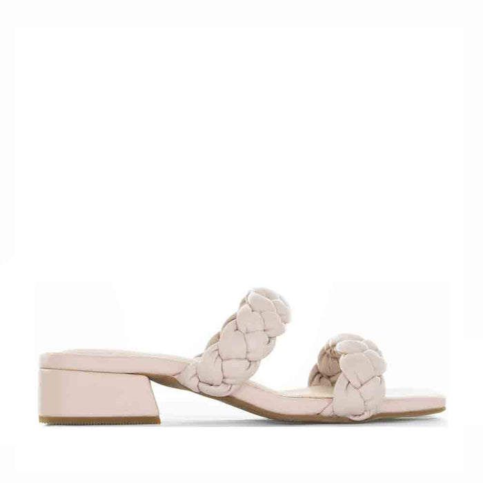 Le Sansa Gillian blush slip-on shoes with a soft fabric upper and comfortable design, displayed in a close-up image.