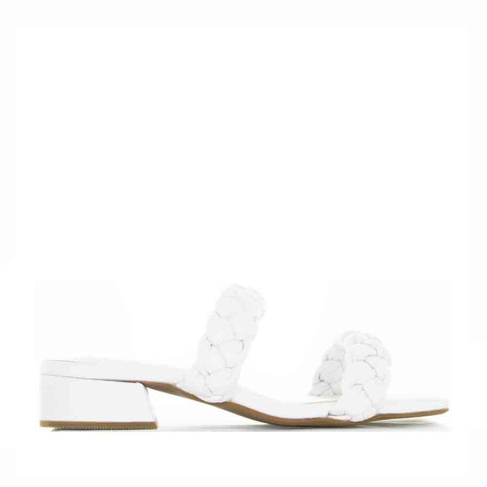 Le Sansa Gillian White slip-on shoes with white fabric upper and comfortable design, perfect for casual wear.