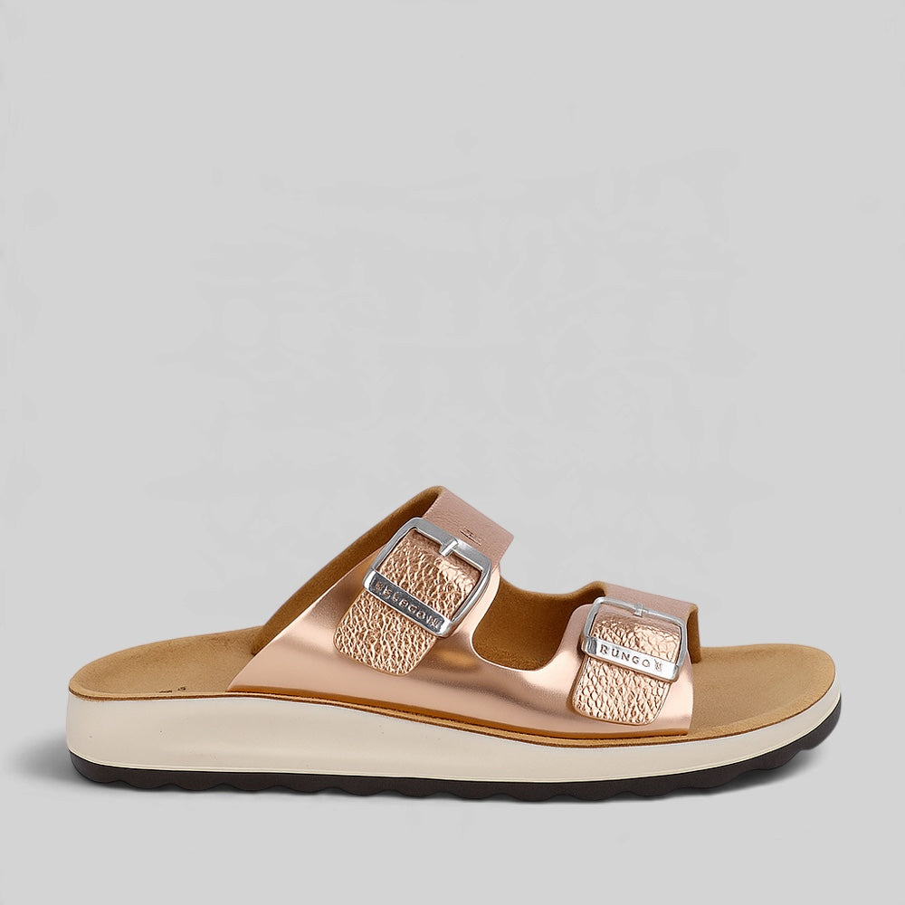 Fly Flot gold flats with sleek design, featuring soft material and comfortable sole, perfect for casual or dressy wear.