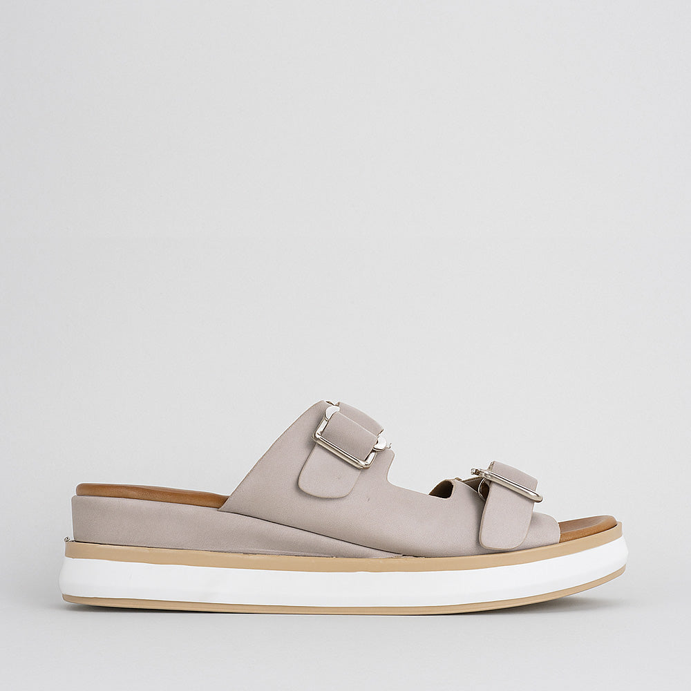 Le Sansa slip-ons in silver grey, showcasing the stylish, comfortable footwear with a sleek, modern design.