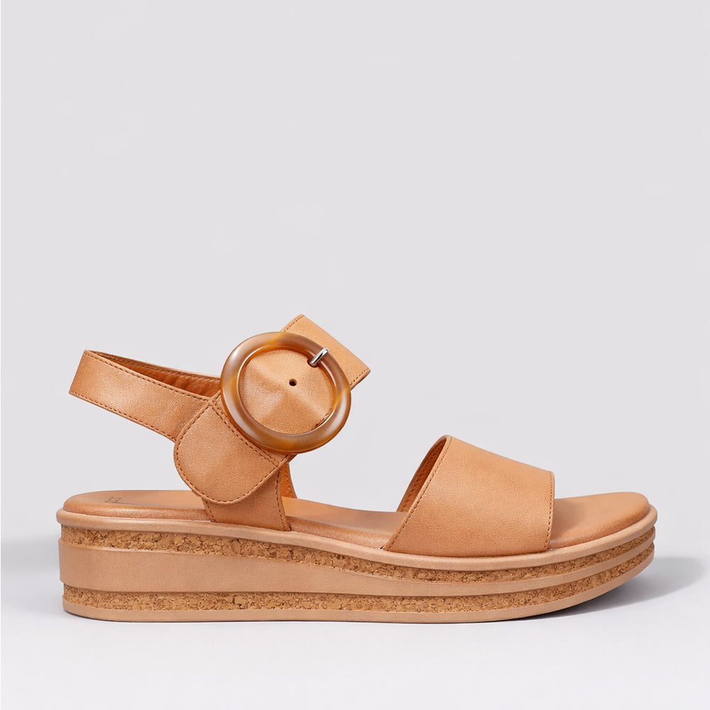 Le Sansa guard tan sandals with stylish straps and comfortable design, perfect for casual summer wear.