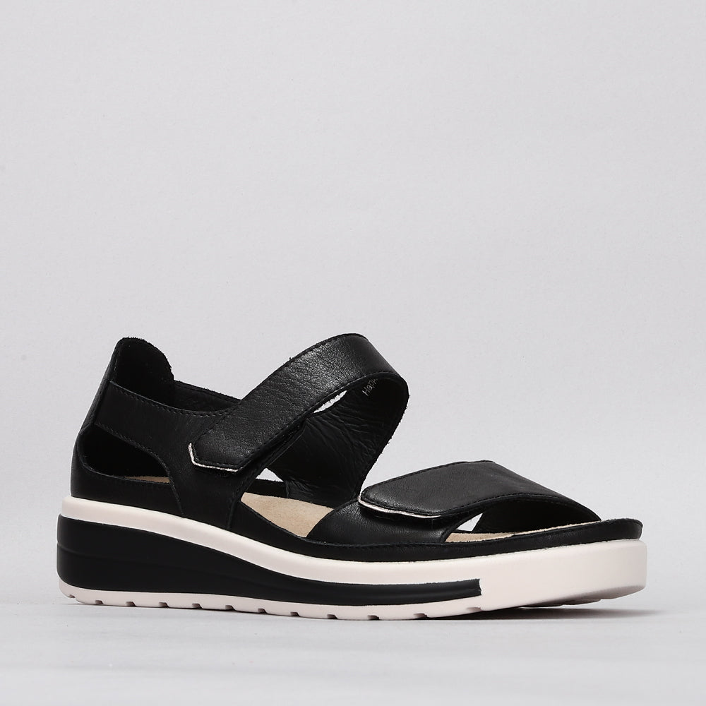 Naked Arches Happy Black sandals with open toe design and adjustable straps, showcasing comfortable footwear style.