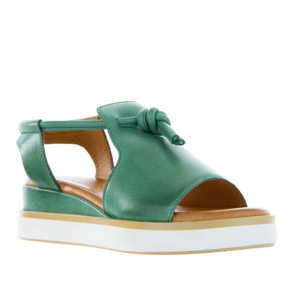 Le Sansa Hide Pine sandals featuring natural tan leather straps and cushioned footbed for casual outdoor wear.
