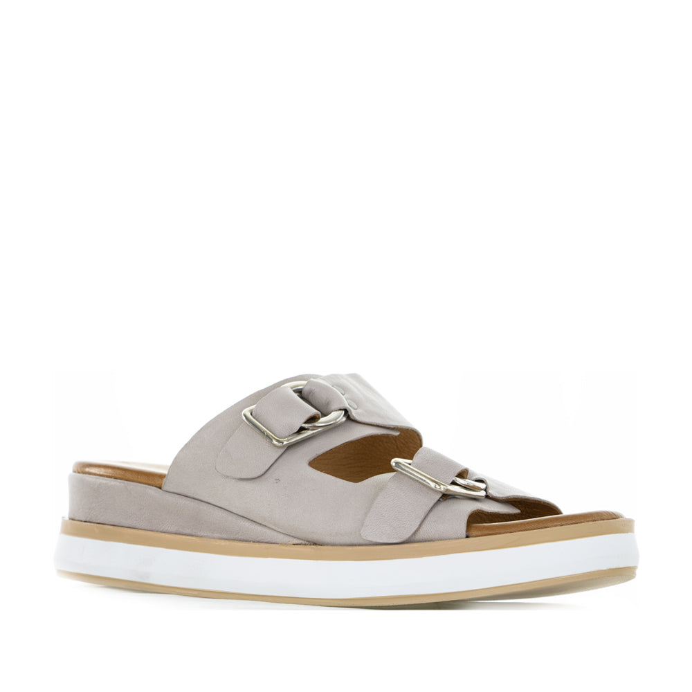 Le Sansa Holister silver grey slip-on shoes with a sleek design and comfortable fit, shown from a side angle.