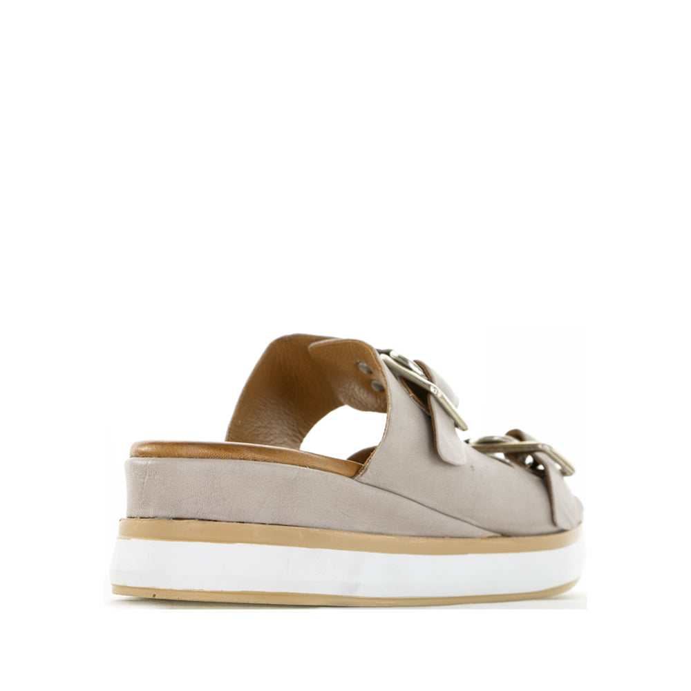 Le Sansa Holister silver grey slip-on shoes with sleek design and comfortable fit, shown on a white background.