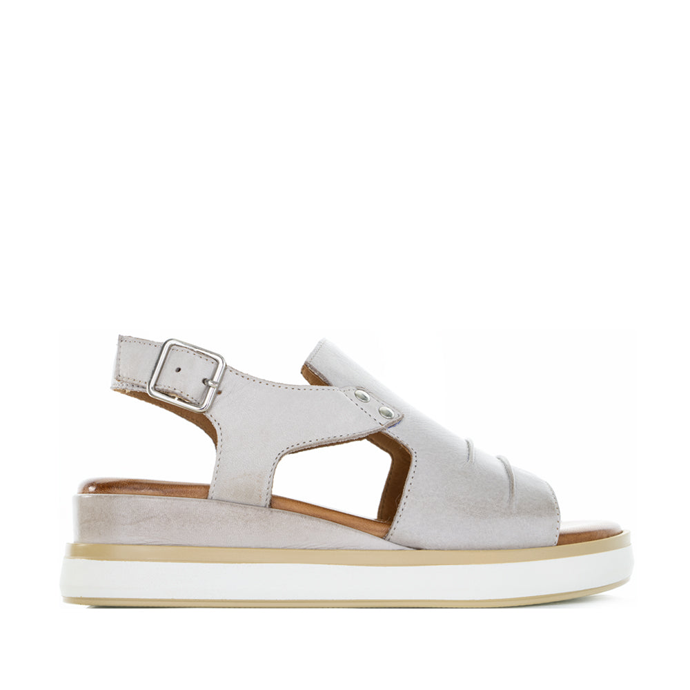 Le Sansa Hype Silver Grey sandals with open toes and ankle straps, showcasing a stylish, casual footwear design.
