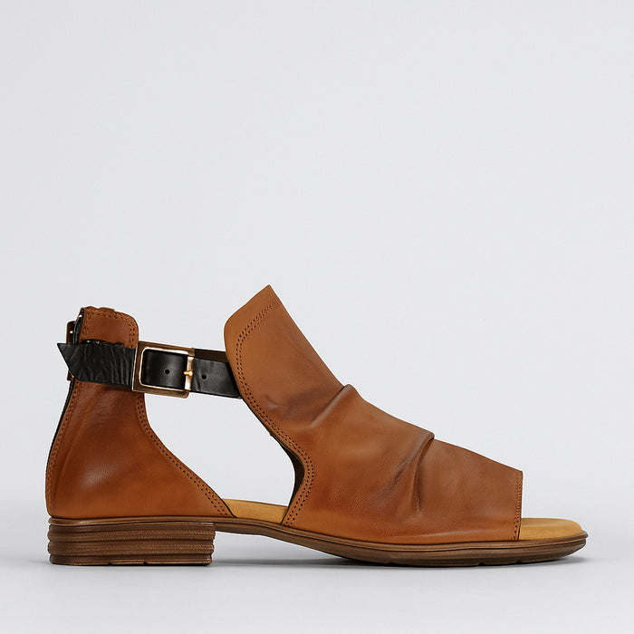 Eos Ilosia Brandy Black sandals featuring a stylish design with black straps and comfortable sole, perfect for casual wear.