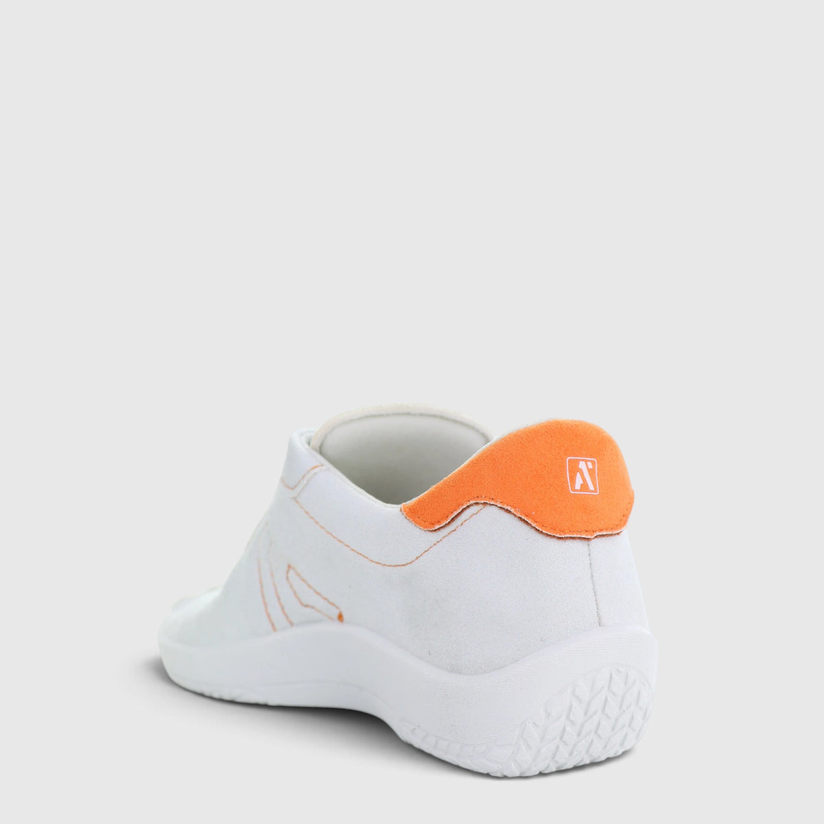 Arcopedico Diamond Luna Pumpkin sneakers showing stylish design and comfortable fit in a natural outdoor setting.