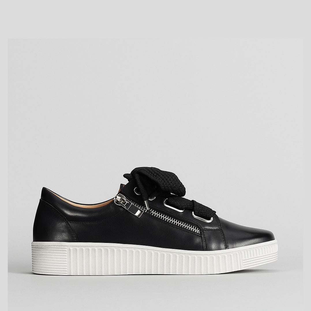 Eos Jovi Black sneakers with sleek black design and comfortable laces, perfect for casual wear and everyday style.