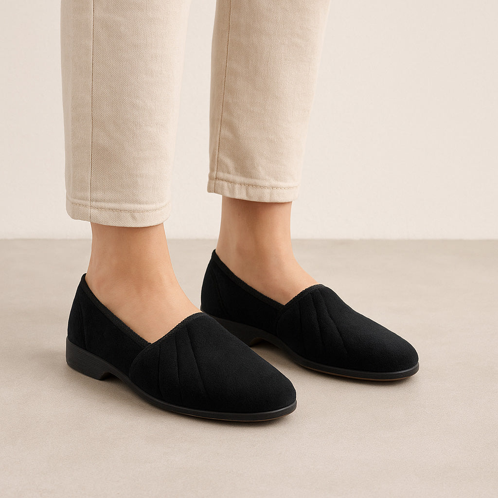 Euroflex Koala black slippers featuring soft black fabric and cozy design, perfect for comfortable indoor wear.