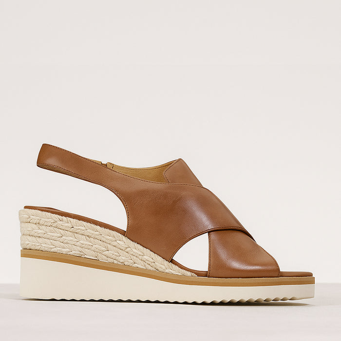 Eos Lazing Brandy sandals with tan straps and flat sole, stylish summer footwear for casual wear.