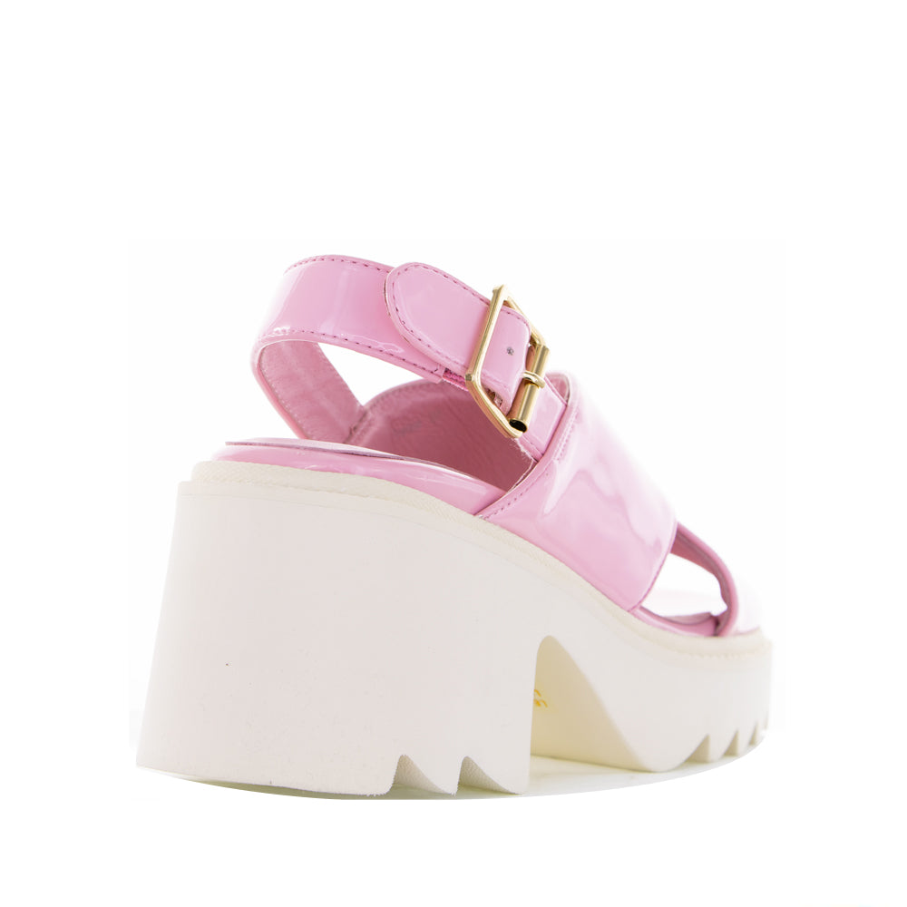 Pink LE SANSA France sandals with open toes and ankle straps, stylish footwear for casual or summer wear.