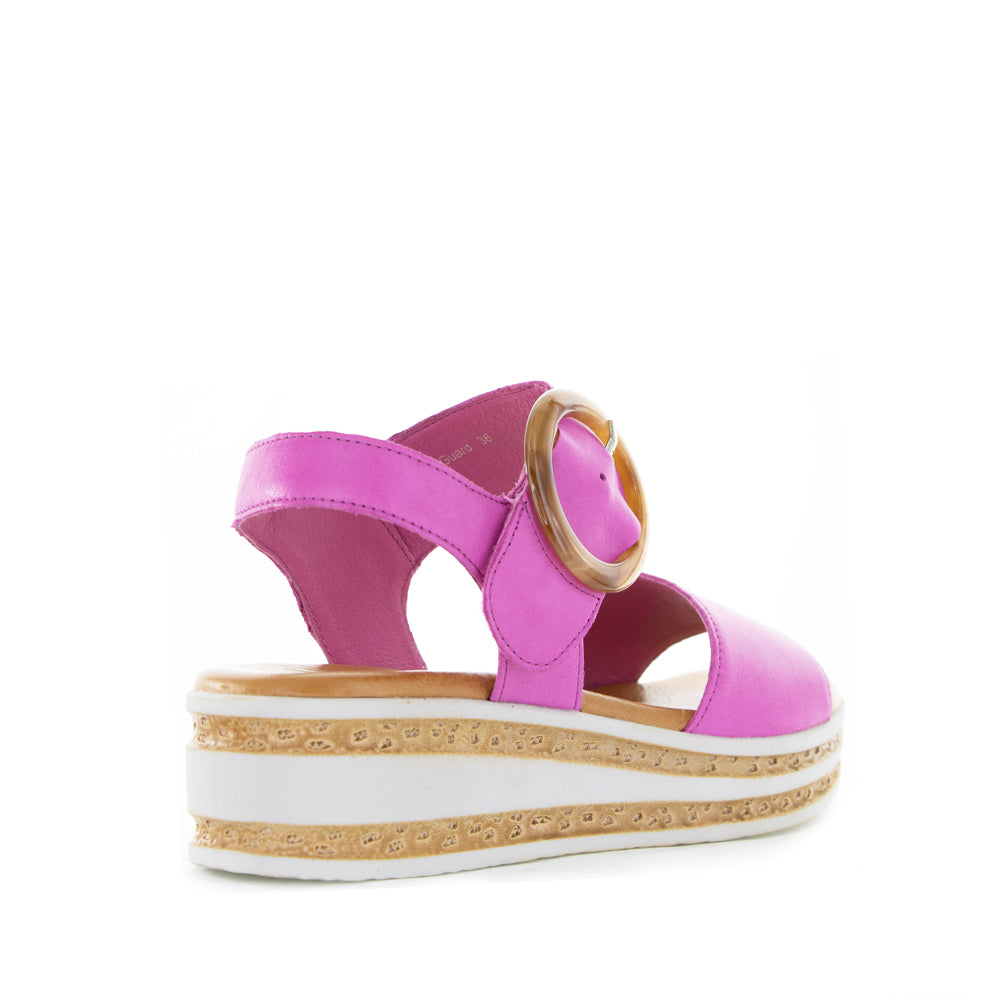 Le Sansa Guard Hot Pink sandals with open toes and ankle straps, stylish footwear for warm weather.