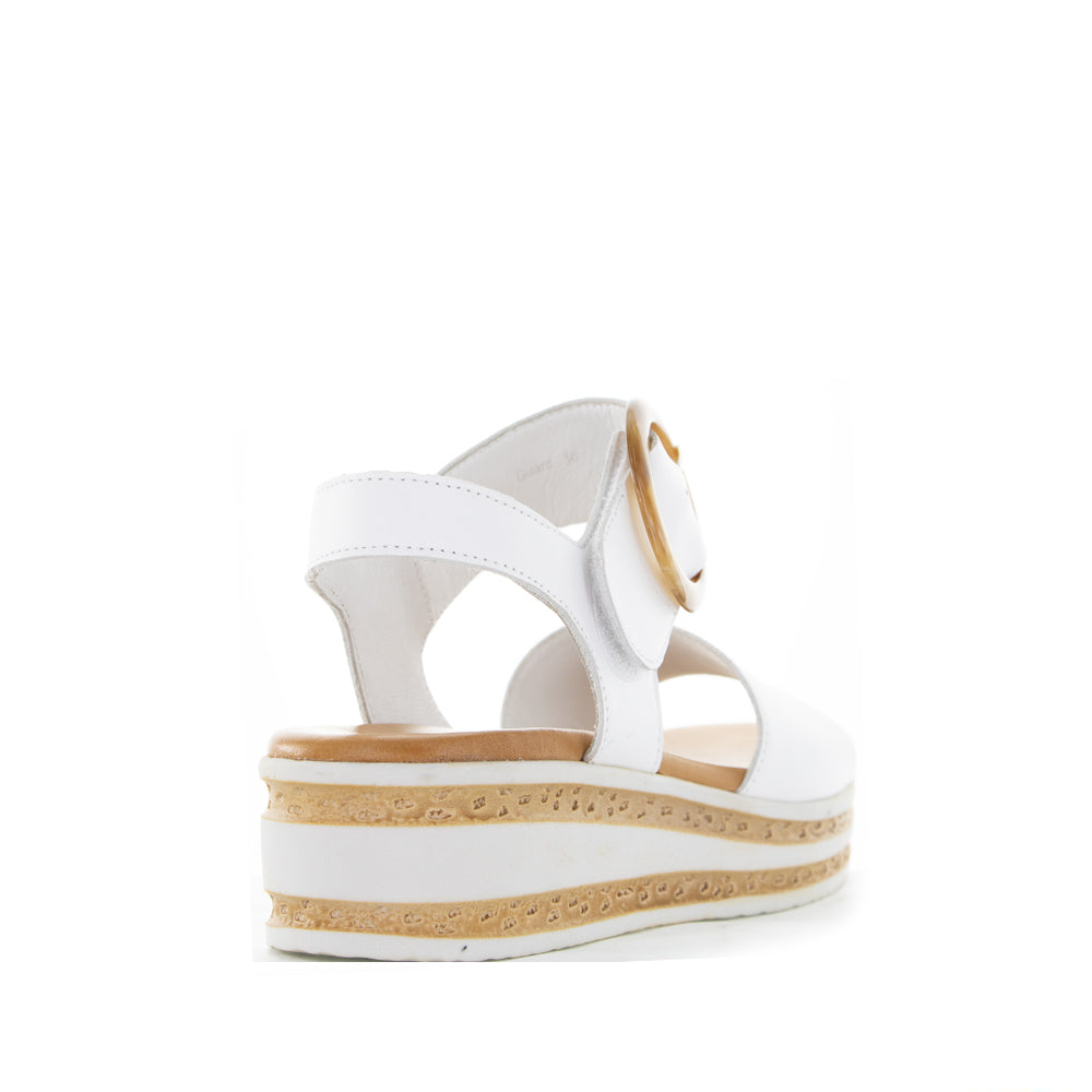 White Le Sansa Guard sandals with open toe design and adjustable straps, stylish and comfortable for casual wear.