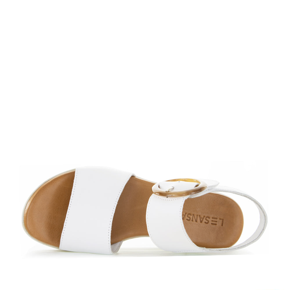 White Le Sansa Guard sandals featuring open toe design and adjustable straps, perfect for casual summer wear.