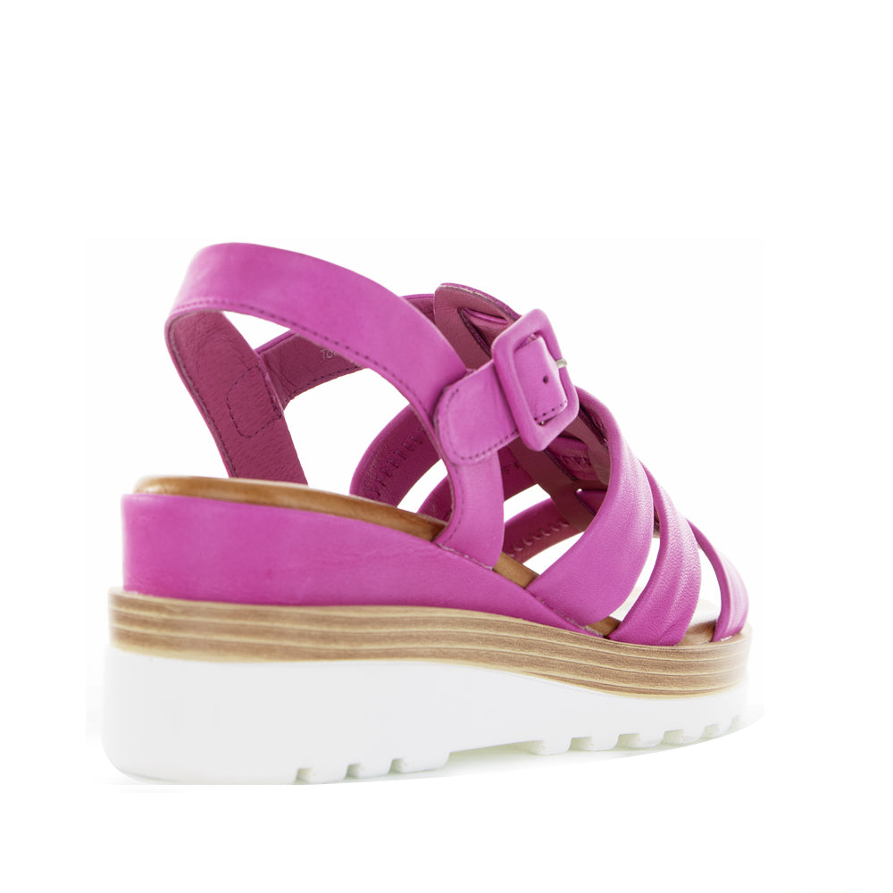 Le Sansa Toast hot pink sandals with open-toe design and ankle strap, stylish footwear for casual wear.
