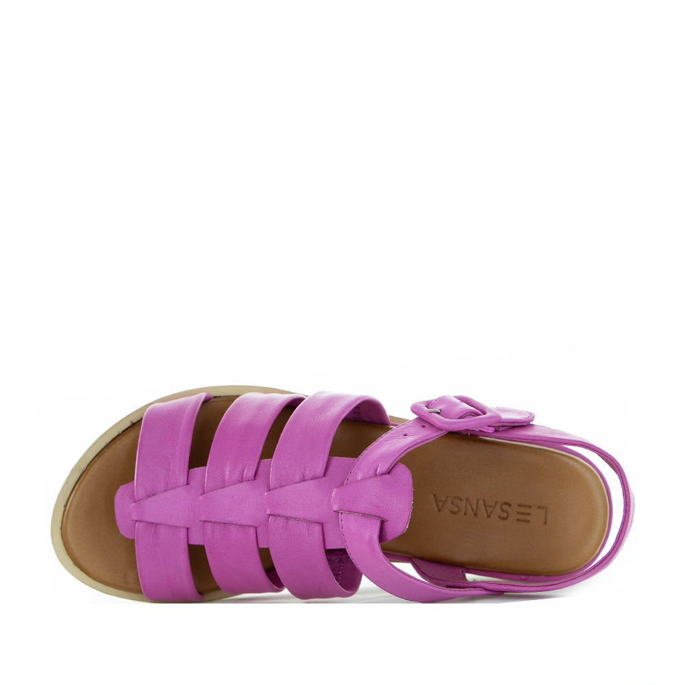 Le Sansa Toast Hot Pink sandals with open toes and ankle straps, featuring a vibrant fuchsia color and stylish design.