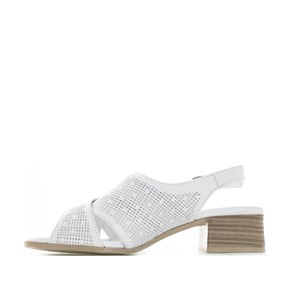 Le Sansa Lita White sandals with open toes and ankle straps, featuring a stylish white leather design.