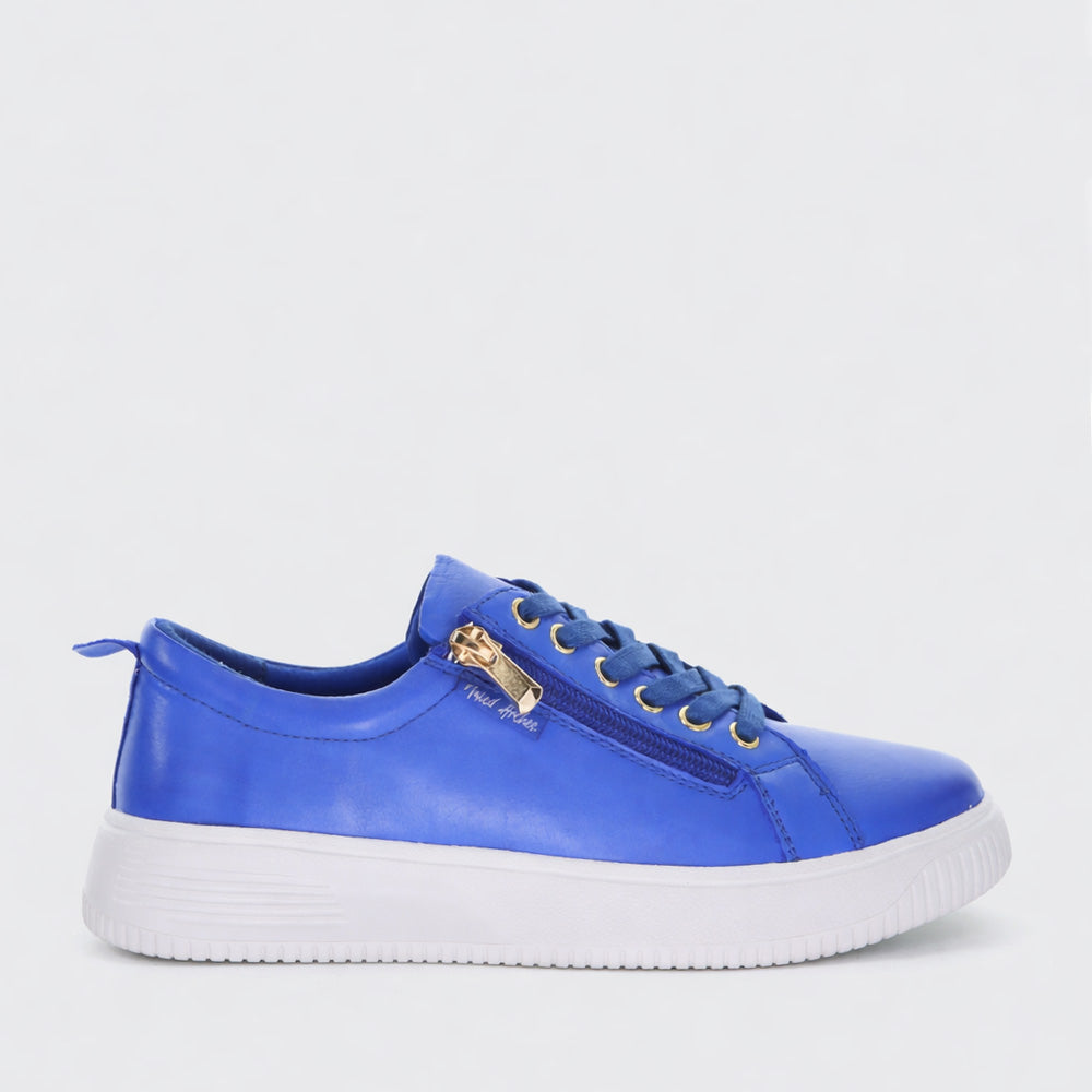 Naked Arches Nelly Royal Blue sneakers with white sole and lace-up design, stylish casual footwear for women.