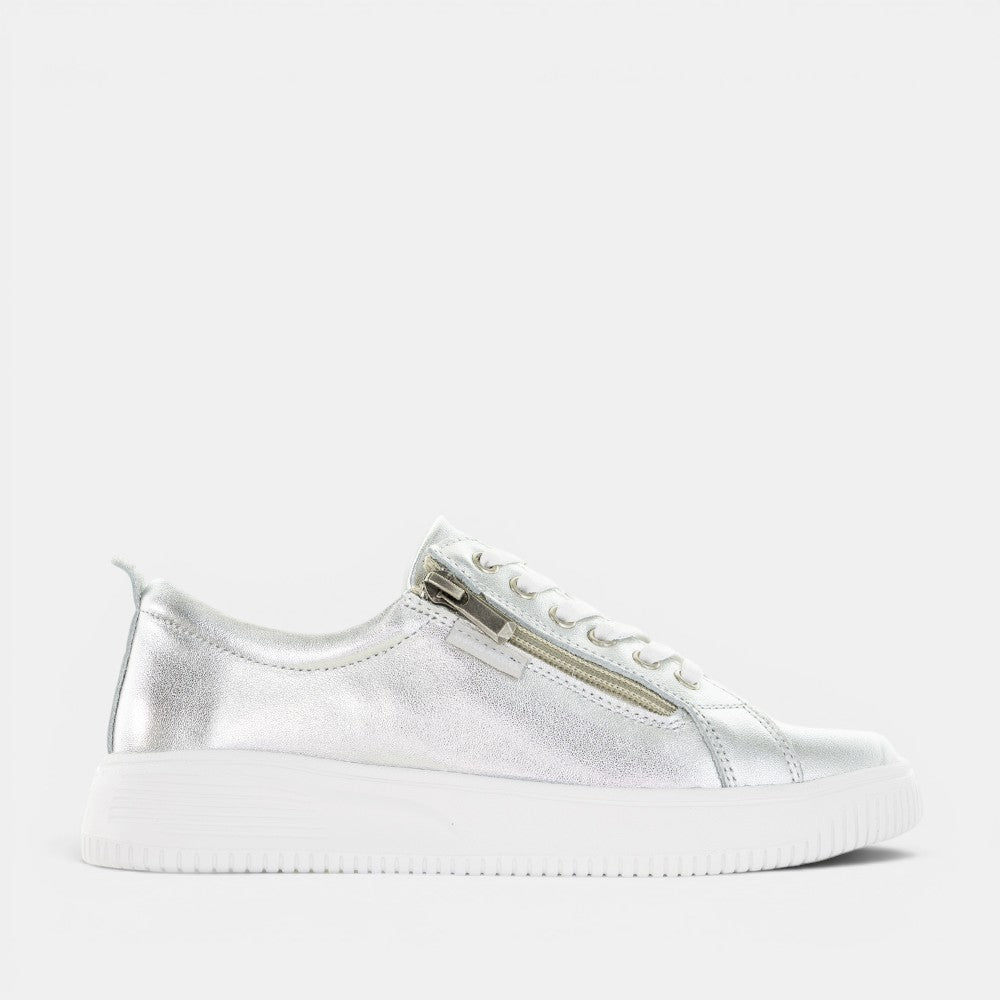Silver NAKED ARCHES NELLY sneakers with sleek design and cushioned sole, shown from the front view.