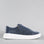 NAKED ARCHES Noble Navy sneakers showing navy blue canvas shoes with white soles and laces, stylish and casual footwear.