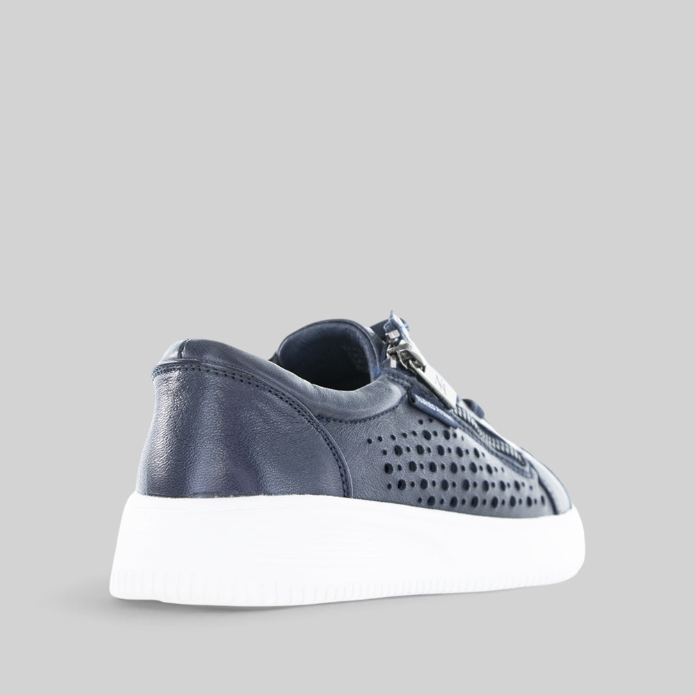 Naked Arches Noble Navy sneakers featuring navy blue canvas and white rubber soles, with laces and minimal branding details.