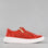 Naked Arches Noble Red sneakers with red and white design, featuring lace-up closure and athletic style.