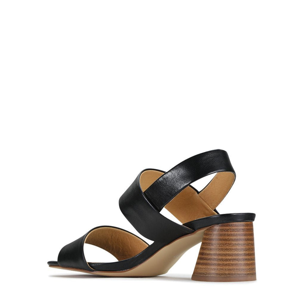 Black EOS PETO sling-back sandals with open toes and a comfortable strap design on white background.