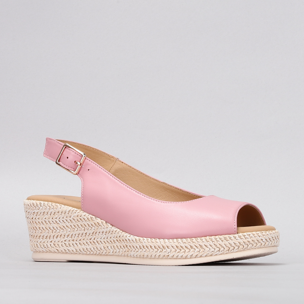 Le Sansa Petunia Baby Pink sandals featuring soft pink straps and comfortable soles, perfect for young children.