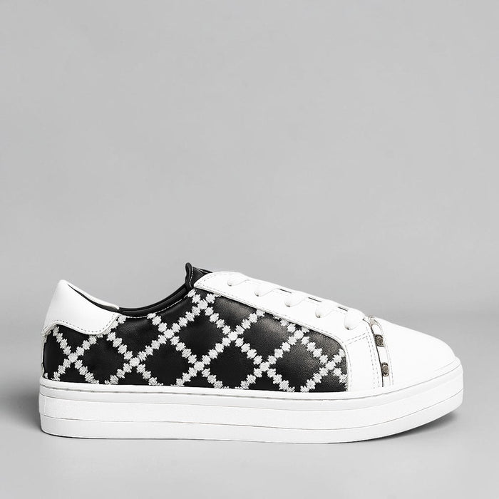 ALFIE & EVIE white and black pleated sneakers with stylish design and comfortable fit, perfect for casual wear.