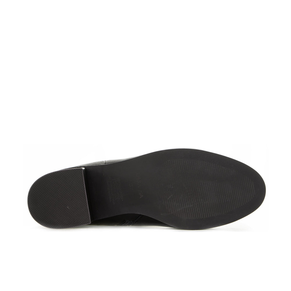 Black LE SANSA ring-shaped boots with sleek design and sturdy soles, perfect for stylish, modern footwear.