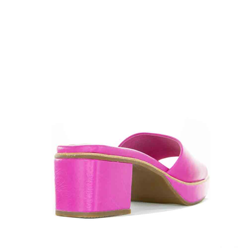 Le Sansa Rosemary Pink slip-on shoes in vibrant pink with a sleek design and comfortable fit.