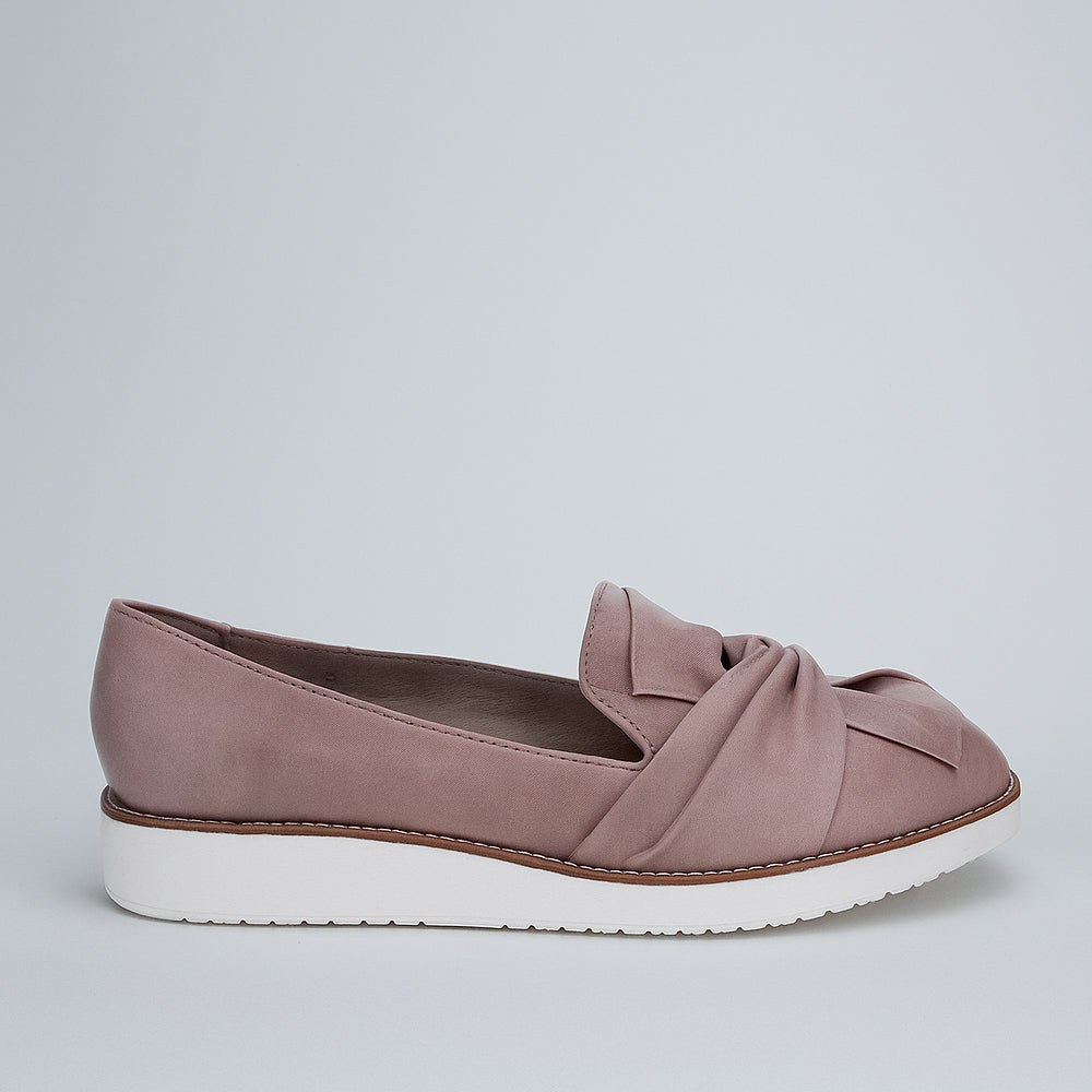 LE SANSA Rosie taupe slip-on shoes with rounded toes and soft fabric upper, perfect for casual and comfortable wear.