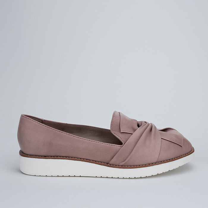 Le Sansa Rosie taupe slip-on shoes with a sleek design and comfortable fit, perfect for casual and stylish footwear.