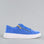 Naked Arches Noble Royal Blue sneakers with sleek design and vibrant blue color, showing the stylish footwear from the side view.