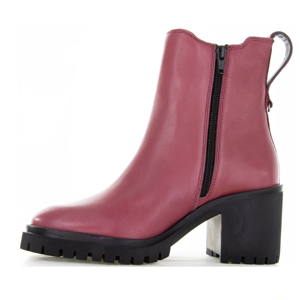 Le Sansa Samira hot pink boots with chunky heels and stylish design, perfect for trendy and bold fashion statements.