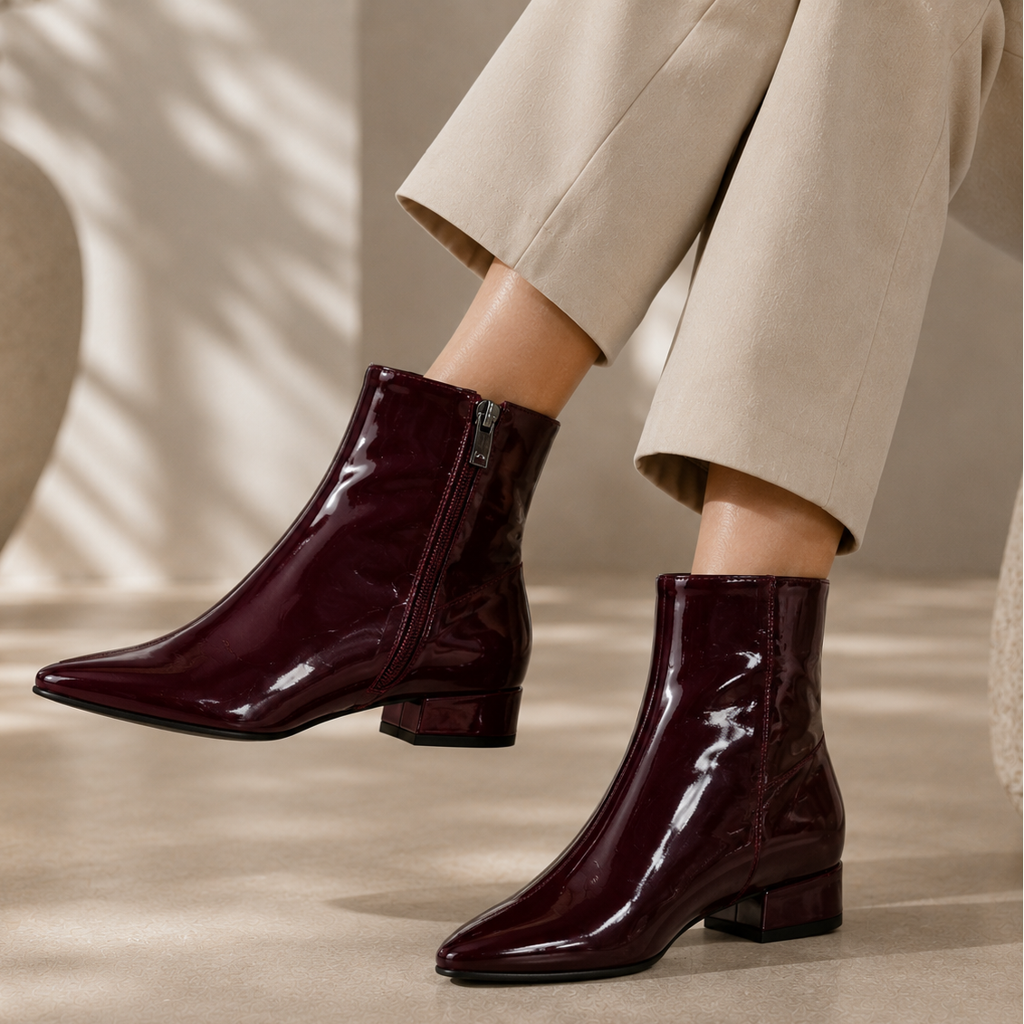 LE SANSA Sasha Merlot Patent Boots, stylish knee-high footwear with shiny red patent leather finish.