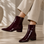 LE SANSA Sasha Merlot Patent Boots, stylish knee-high footwear with shiny red patent leather finish.