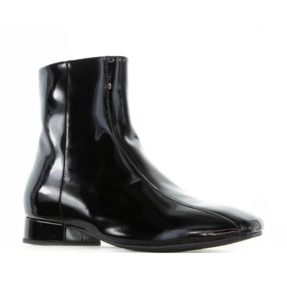 Black patent boots from Le Sansa Sasha collection, stylish ankle-length footwear with sleek shiny finish.