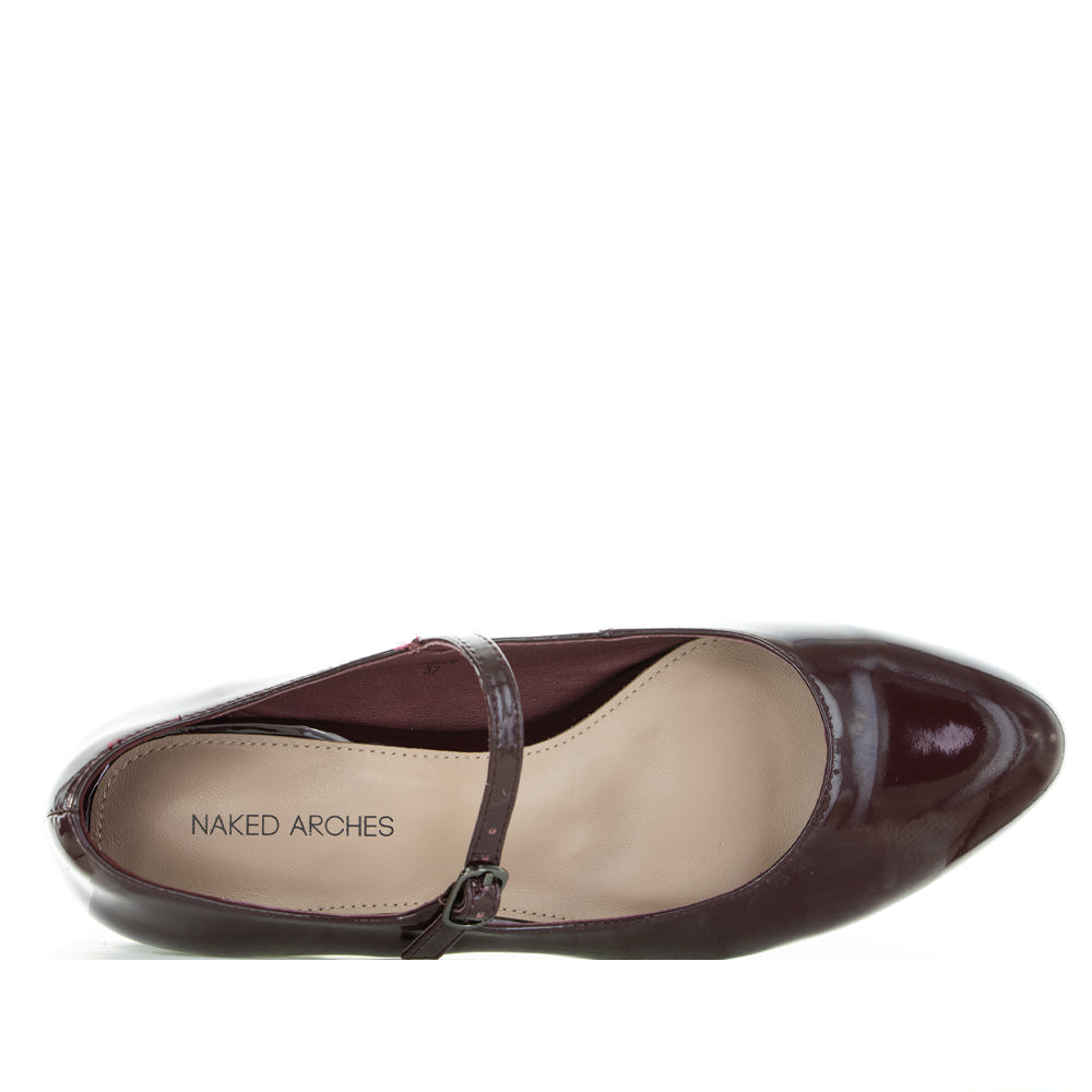 Naked Arches Merlot Patent Sandals with sleek design and shiny merlot-colored straps, showcasing stylish footwear.