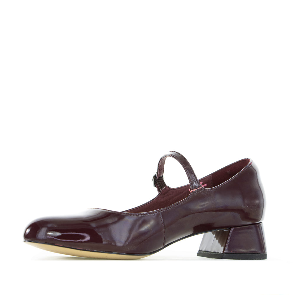 NAKED ARCHES Merlot Patent Sandals with sleek design and shiny red finish, showcasing stylish footwear with comfortable straps.
